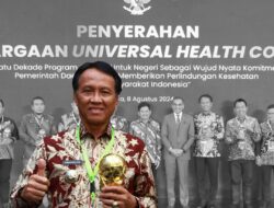 Pj. Bupati OKI Dianugerahi UHC Award karena Cover 97 % Warganya Lewat JKN-Kes,
