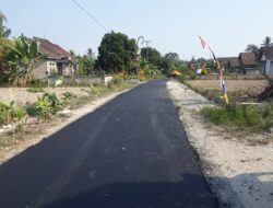 Jalan Hotmix Baru di Ruas Jalan Desa Bumi Daya Ke Bumi Asih Banjir Pujian warga